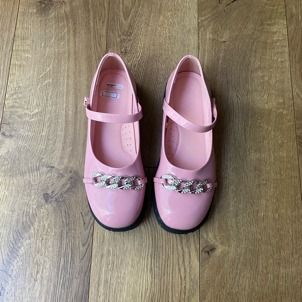 Pink Mary Janes.